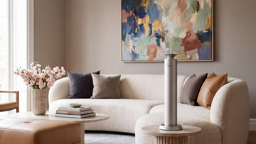 Aroma Max silver Mini Pro cold-air diffuser on a living room side table